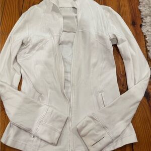 Women's lululemon define Jacket. Size 4 in okay condition spots shown in pics
